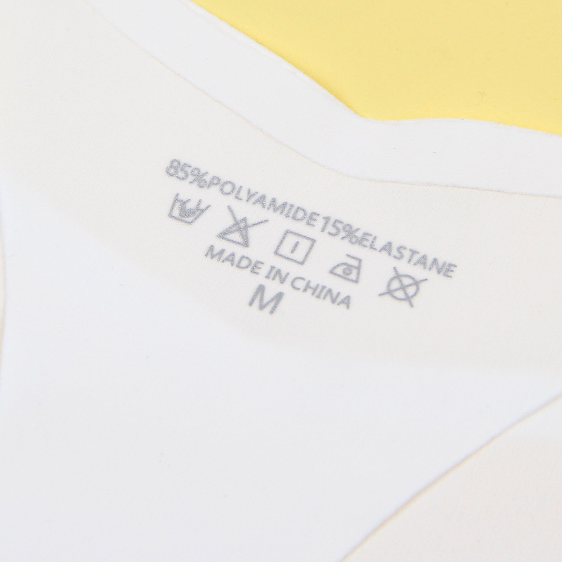 White Ice Silk Seamless Thong – Heart - Shaped Button Waistband Detail - TeaseFashion