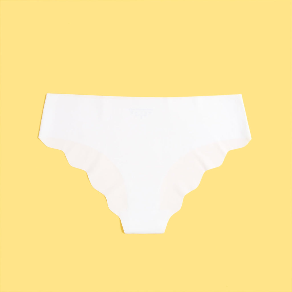 White Ice Silk Seamless Thong – Wavy Lace Hip Detail & Trimmable Leg Opening - TeaseFashion